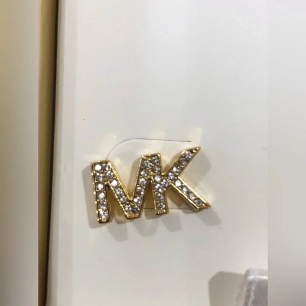 Michael Kors round crystal rhinestone embellished MK logo monogram stud earrings